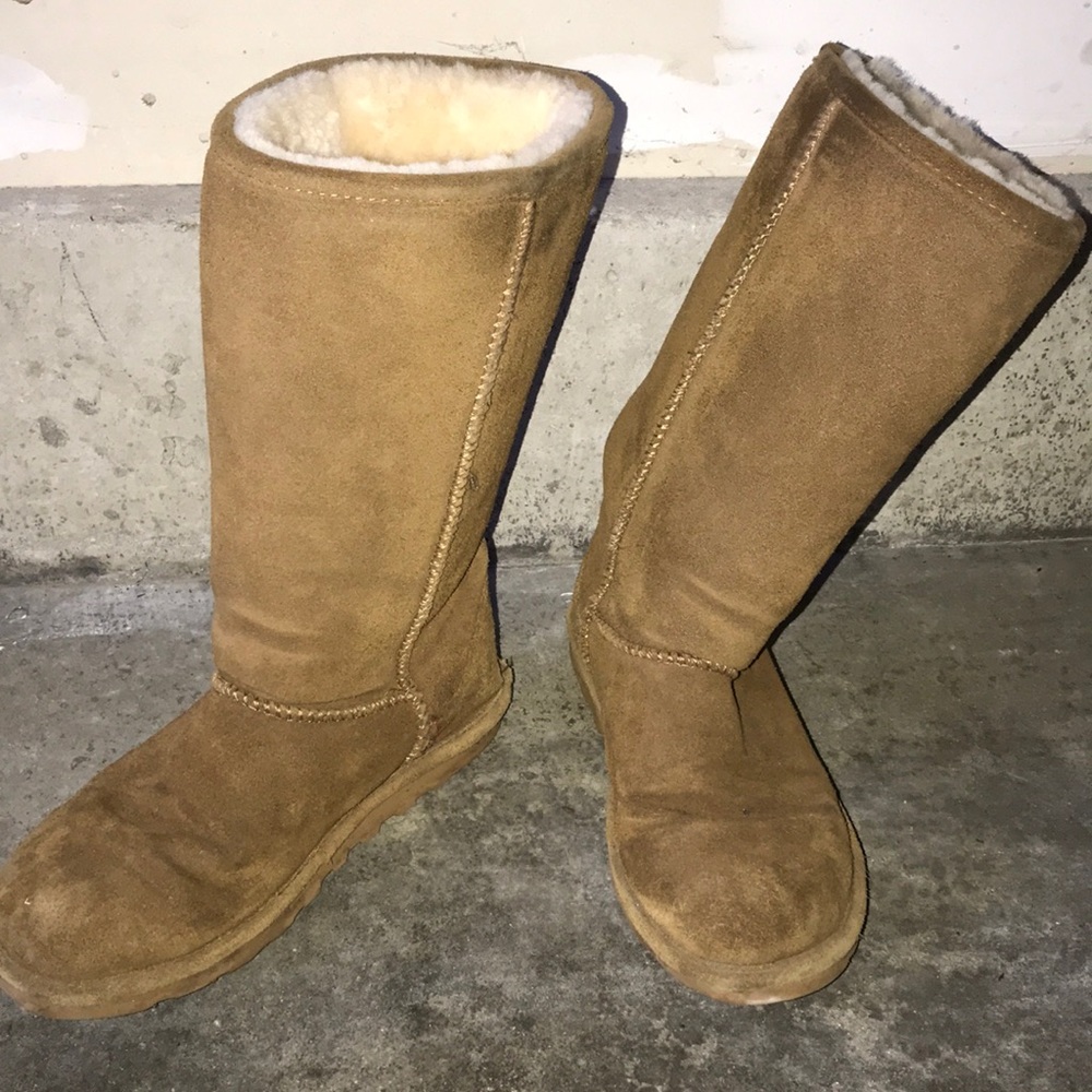 Calf high bear paw boots